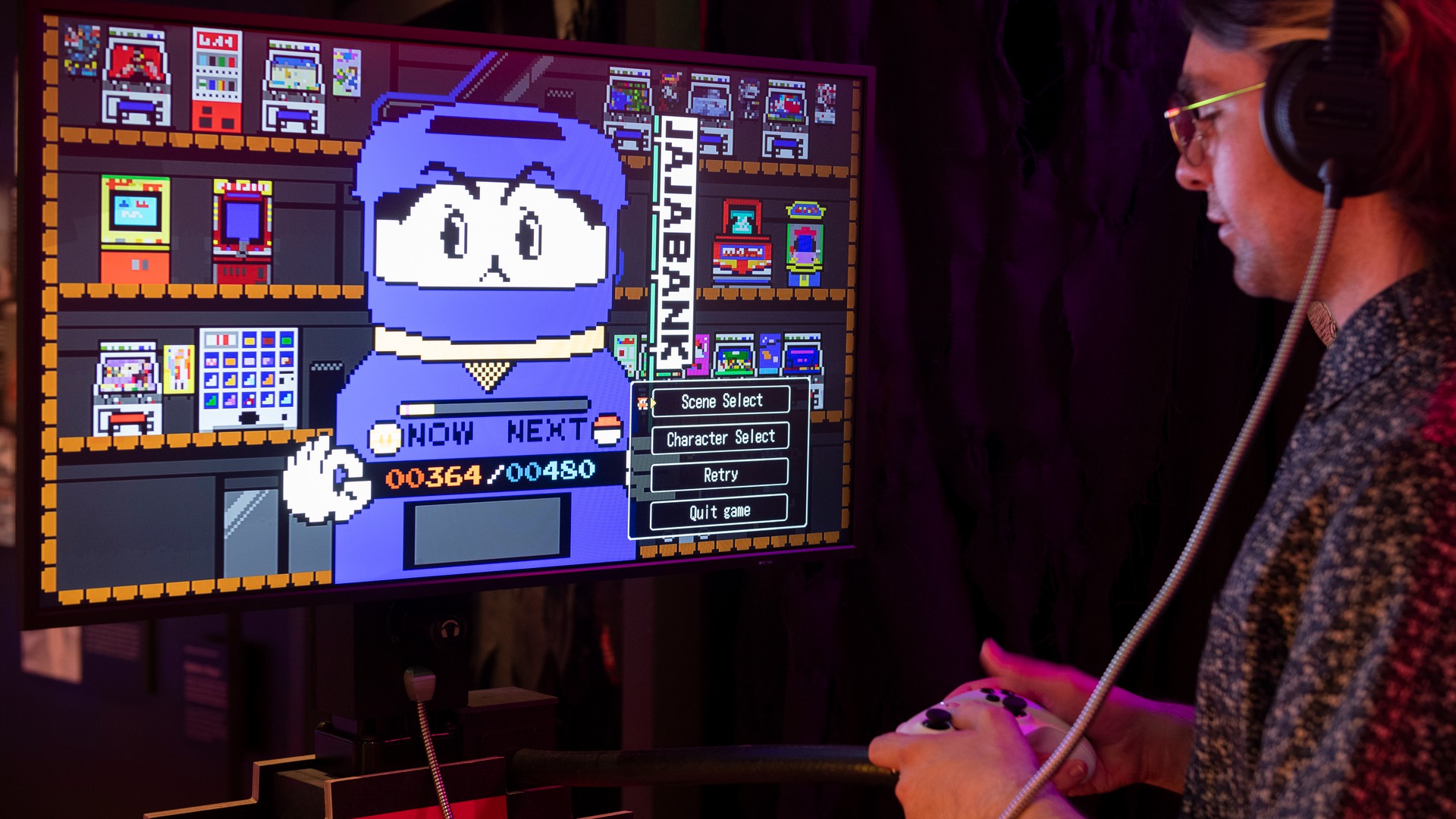 A person playing a video game. Photo.
