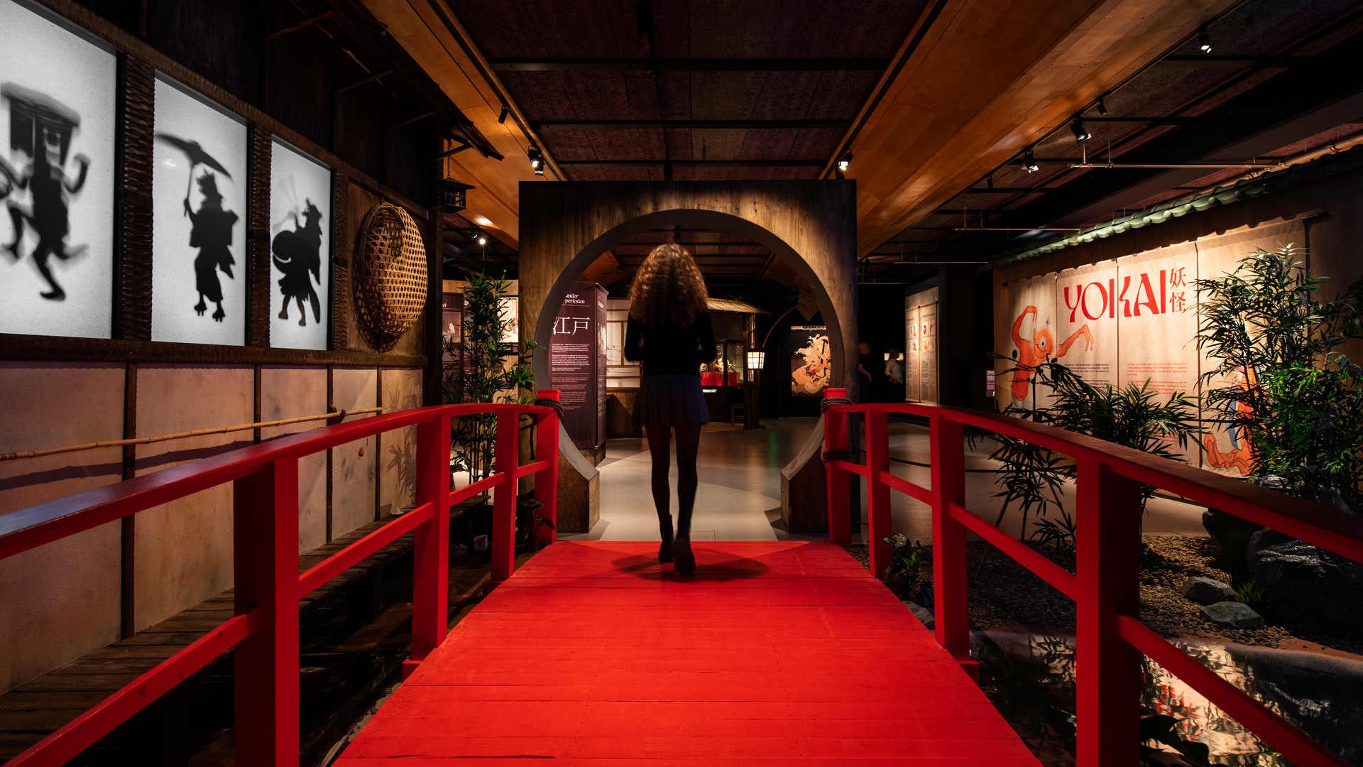 A person entering the exhibitoin. Photo.